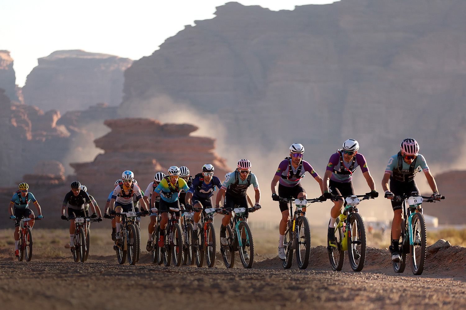 A group of mountains bikers participating in a race in NEOM Titan Desert