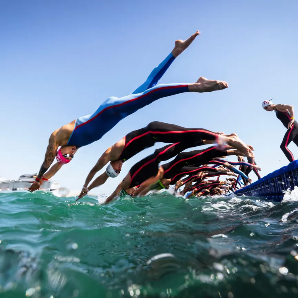  A group of athletes competing in the open water swimming competition in NEOM